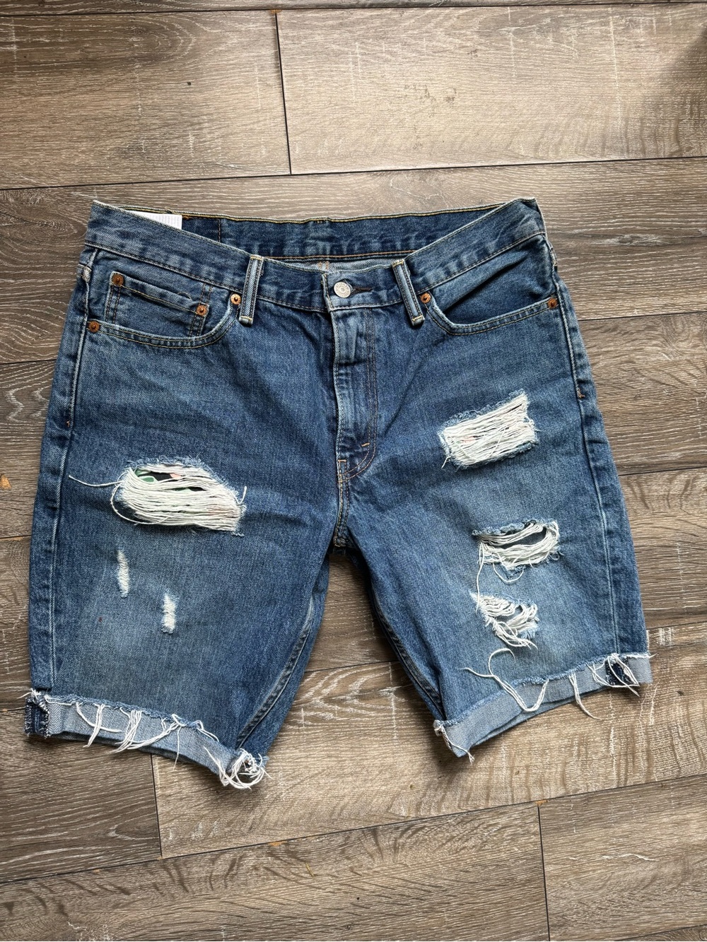 Levi's Distressed Medium Blue Denim Cutoff Jean Shorts